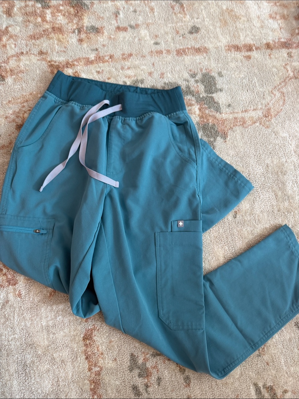 FIGS light teal scrub pants